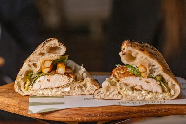 Grilled chicken sandwich stacked high