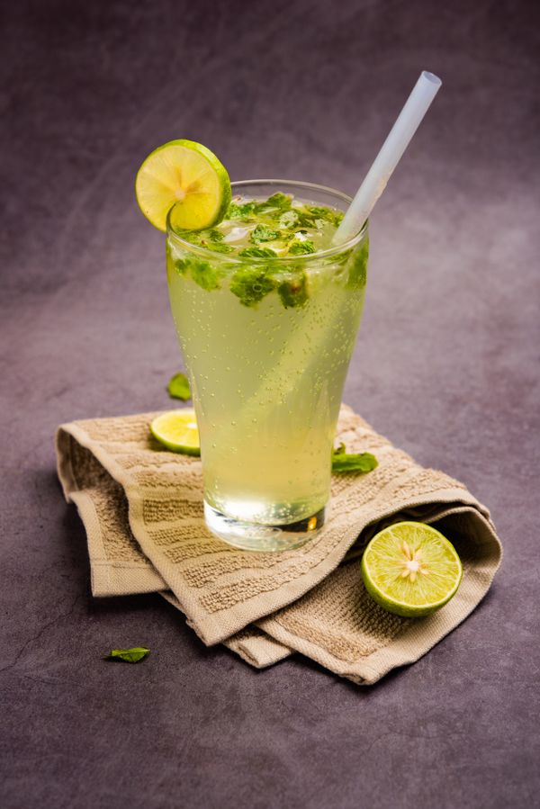 Fresh lime soda with mint over soda and salt